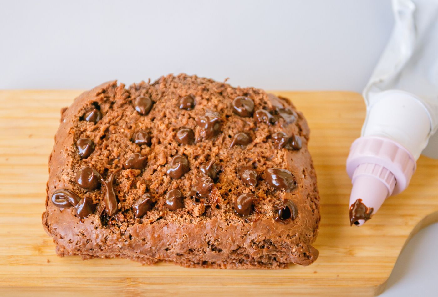 Dark Chocolate Poke Cake with Marshmallow Frosting